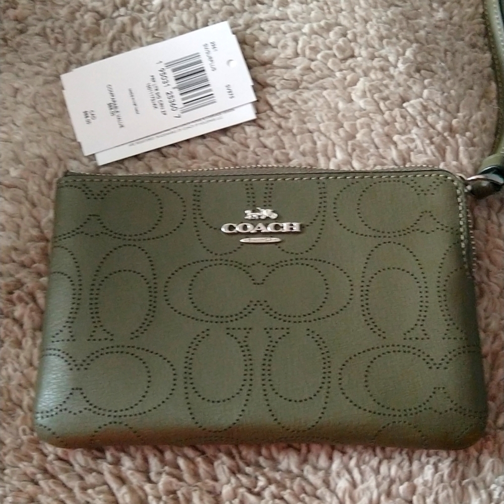 Coach perforated signature zip wristlet